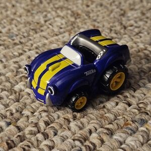 2003 Hasbro Maisto Purple Yellow Tonka Car